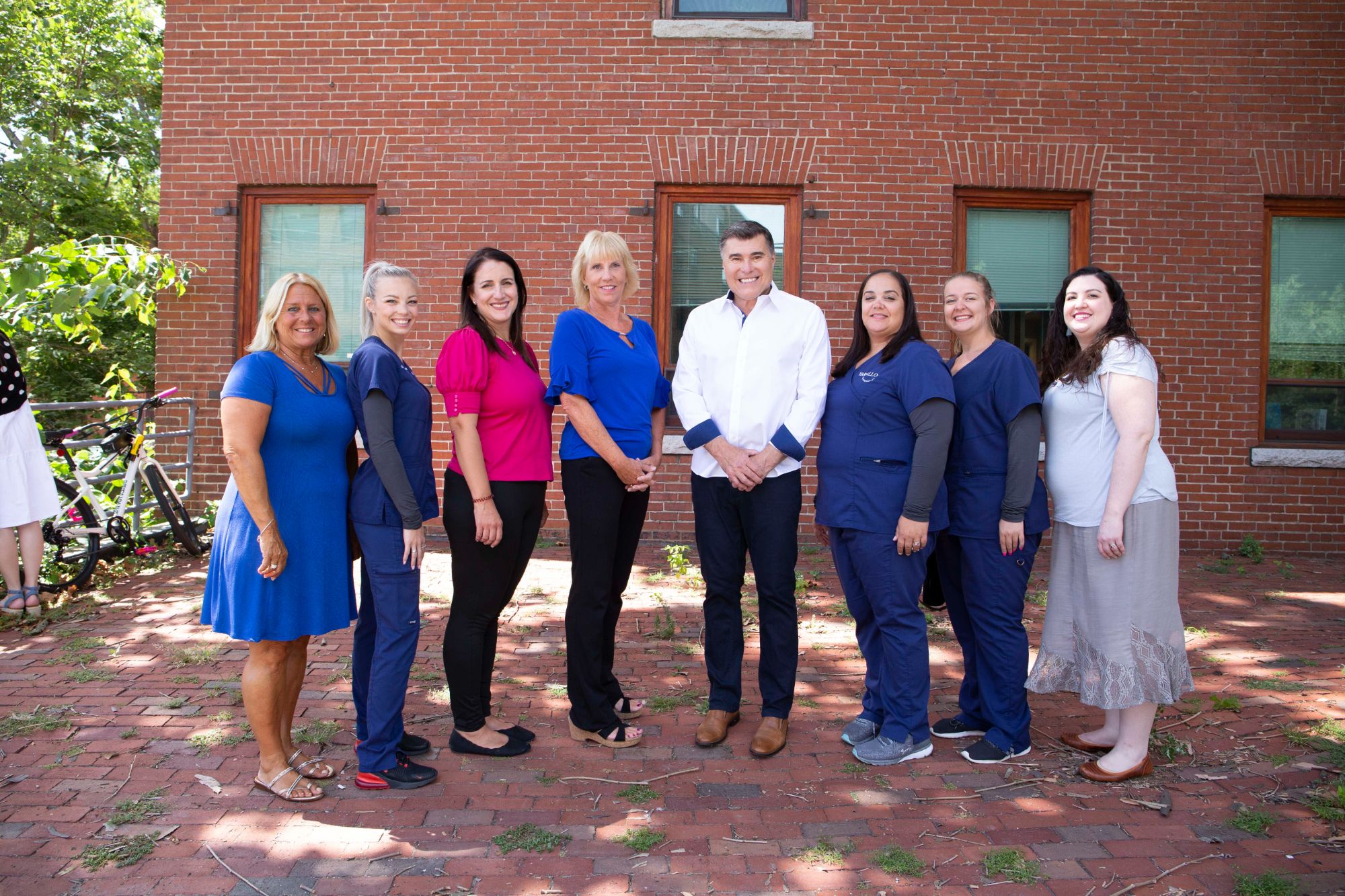 The Varallo Orthodontics team outside the Arlington office