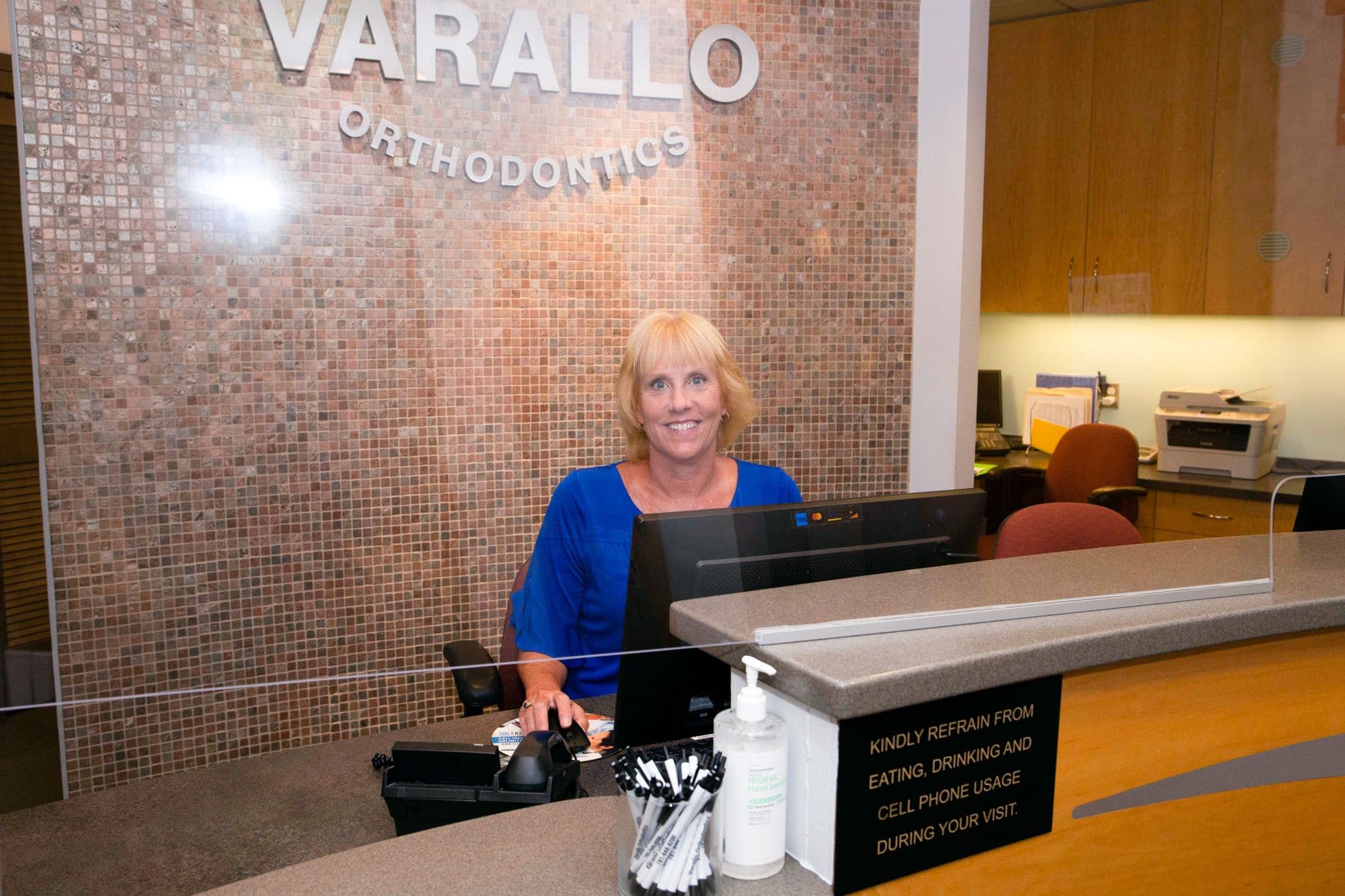 man smiling during consultation with dr. varallo